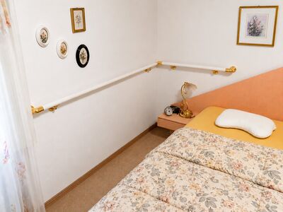 Flexo Haltestange im Schlafzimmer